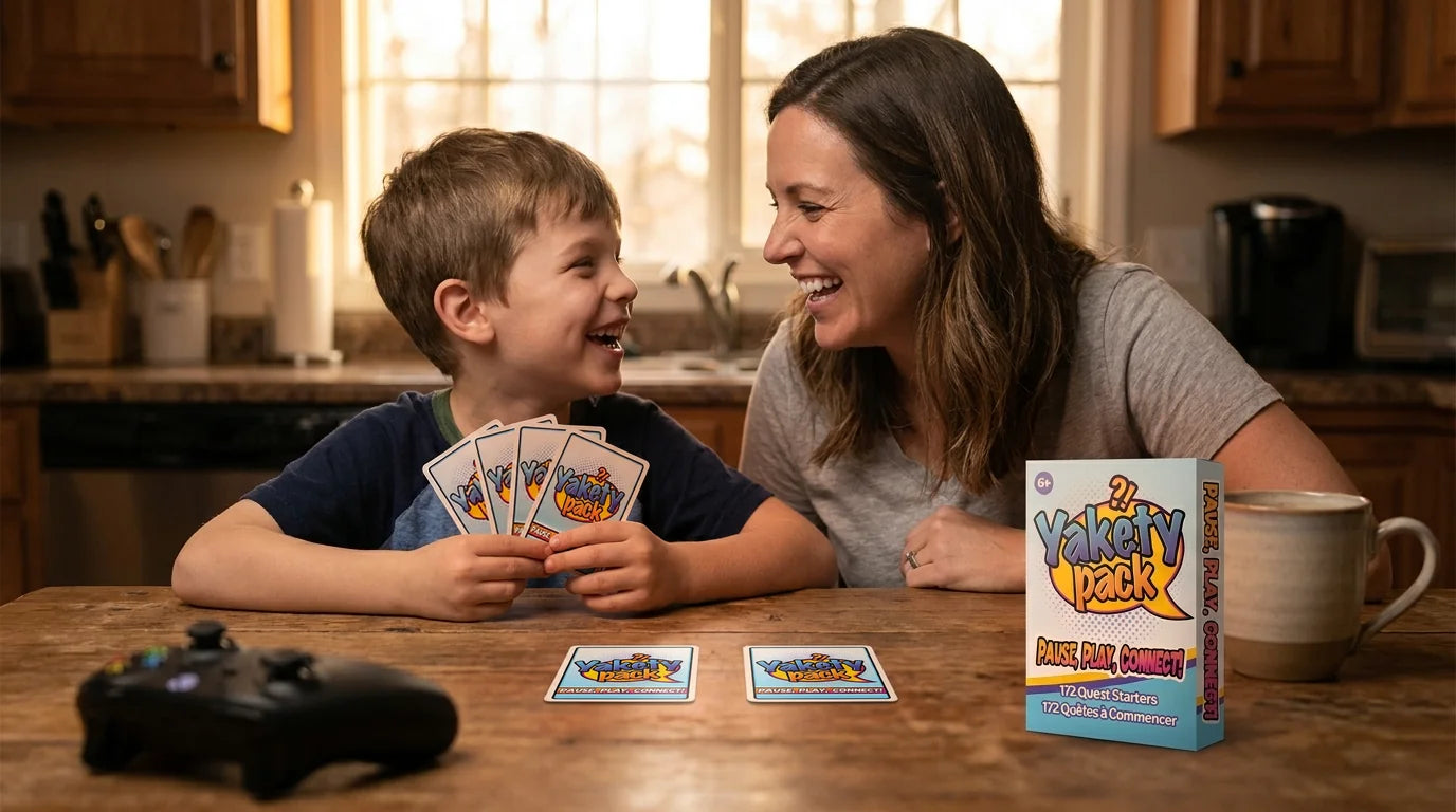 Mom and son laughing over Yakety Pack cards at the kitchen table
